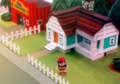 First image featuring Ness outside a house.